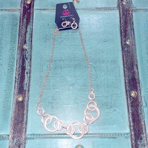 Paparazzi gold necklace and earring combo.